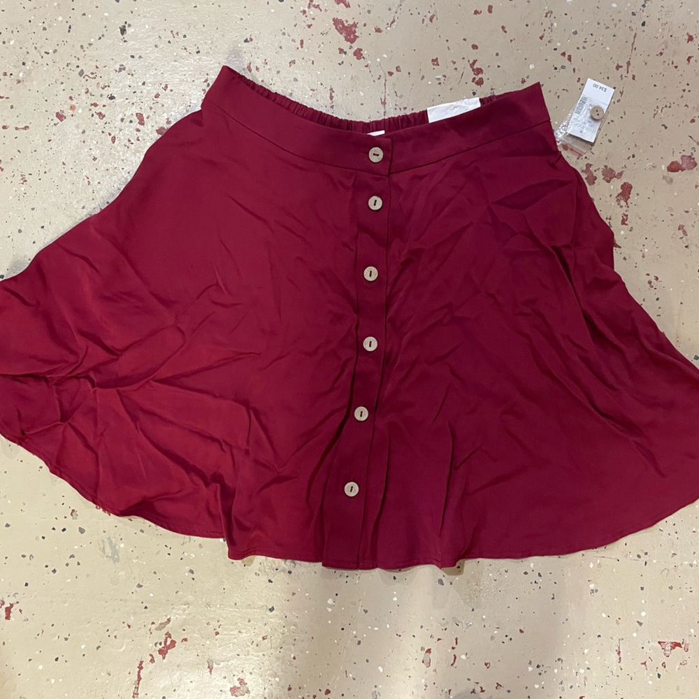 Maurice’s red skirt